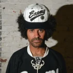 White SAINT Mxxxxxx x Public Enemy SNT Cap View