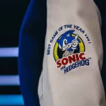 Blue Saint Mxxxxxx x SEGA SAINT Button-Up Varsity Jacket Sleeve